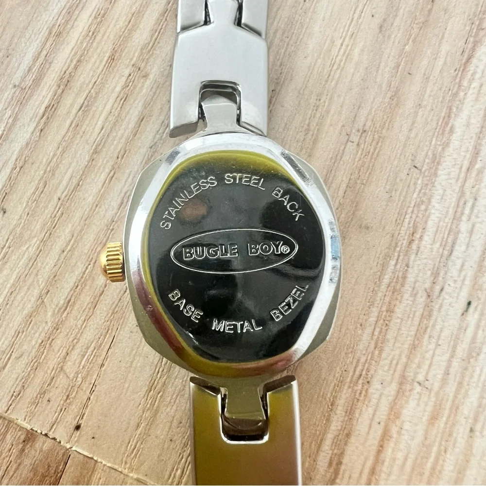 Bugle Boy ladies black dial two toned dress watch NEW BATTERY